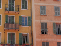 city of Nice old town colourful buildings - greens and yellows