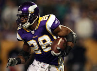 Adrian Peterson running the ball