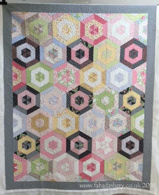 Jelly Roll Hexagon Quilt made by Ruth,  quilted by Frances Meredith