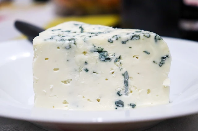 A wedge of blue cheese