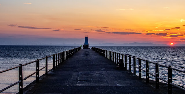 Photo of Maryport pier at sunset