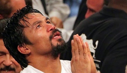 Manny Pacquiao orando