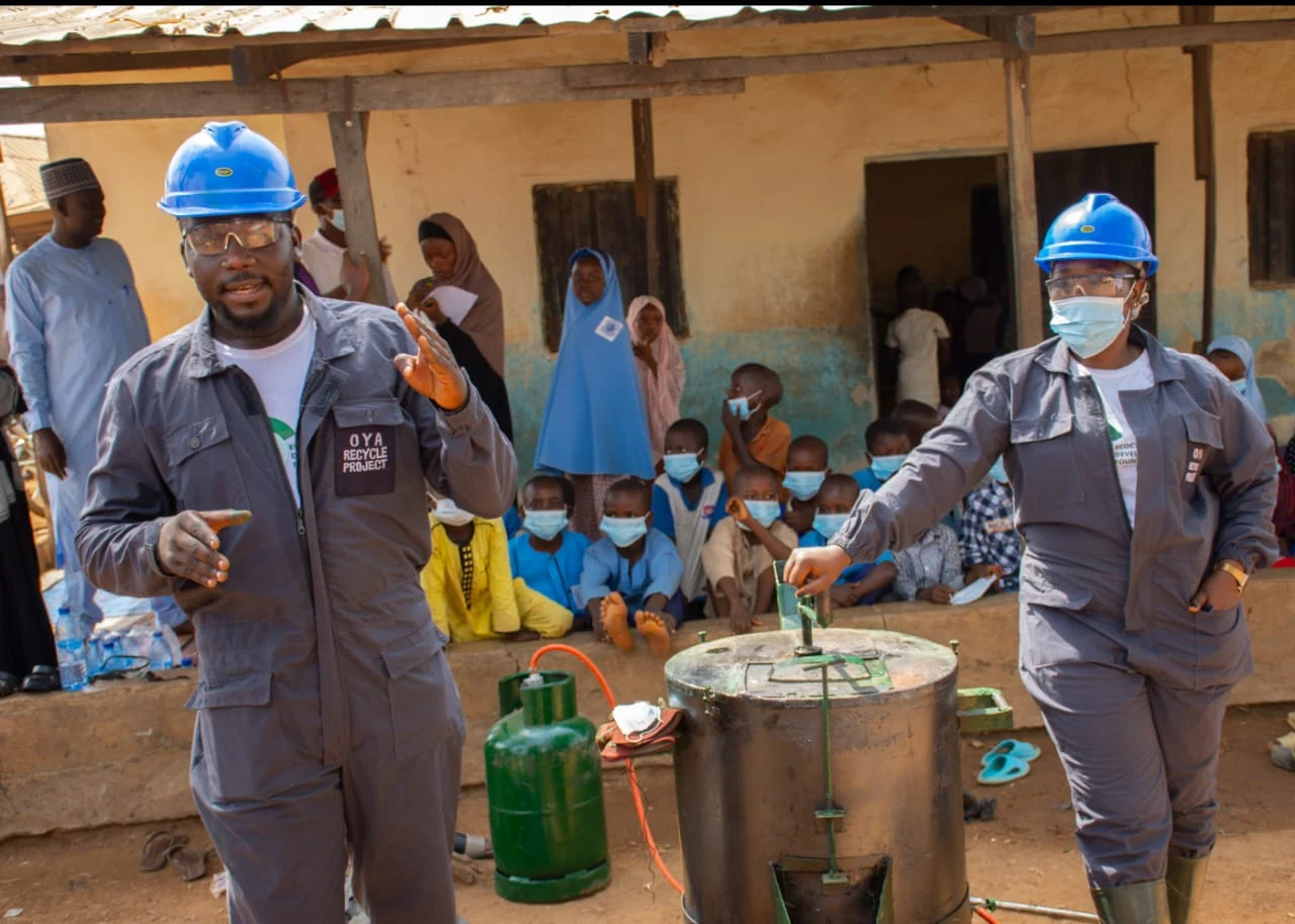 Aliyu Sadiq, left. In the heart of an empowerment project.