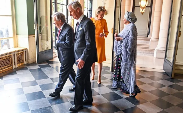 Queen Mathilde wore an orange midi dress by Natan. UN Deputy Secretary-General Amina Mohammed