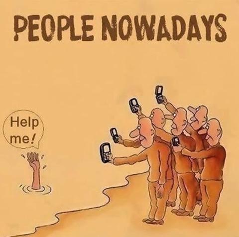 25 Pictures That Prove Technology Is Ruining Society - Why save someone when you can take a video of them?!