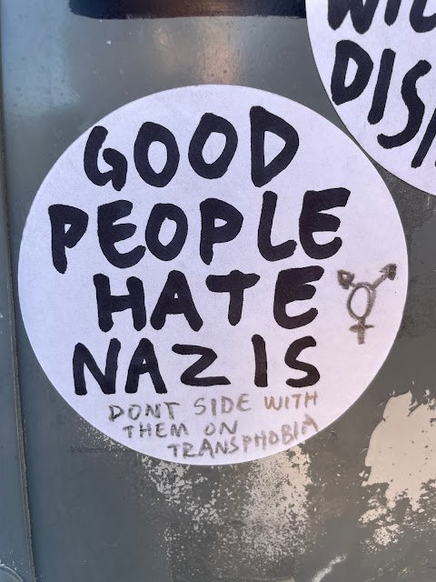 Graffiti sticker: "Good People Hate Nazis - Don't Side With Them on Transphobia"
