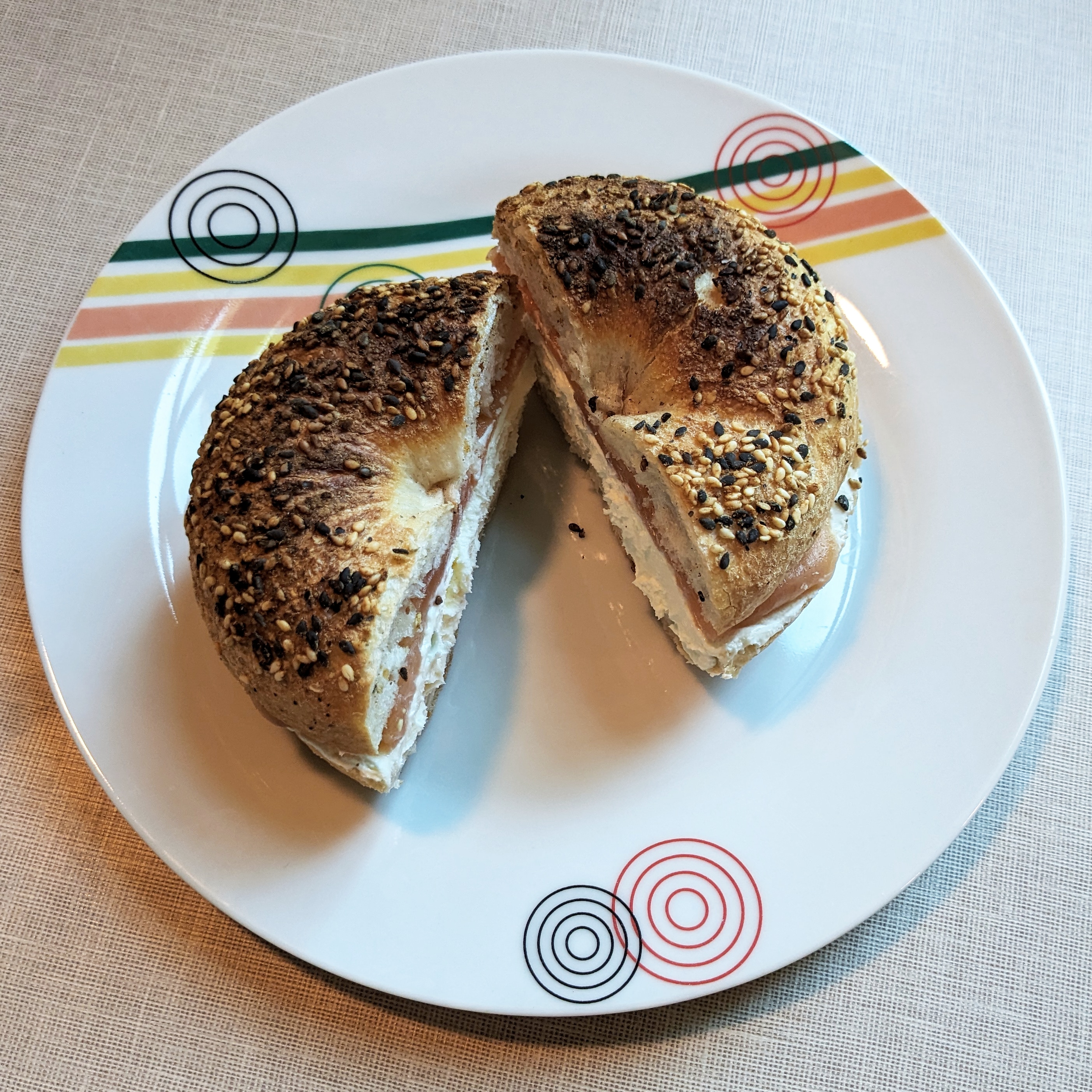 A toasted bagel filled with smoked salmon and cream cheese from Bagels Tbilisi, one of the best places for breakfast in the city