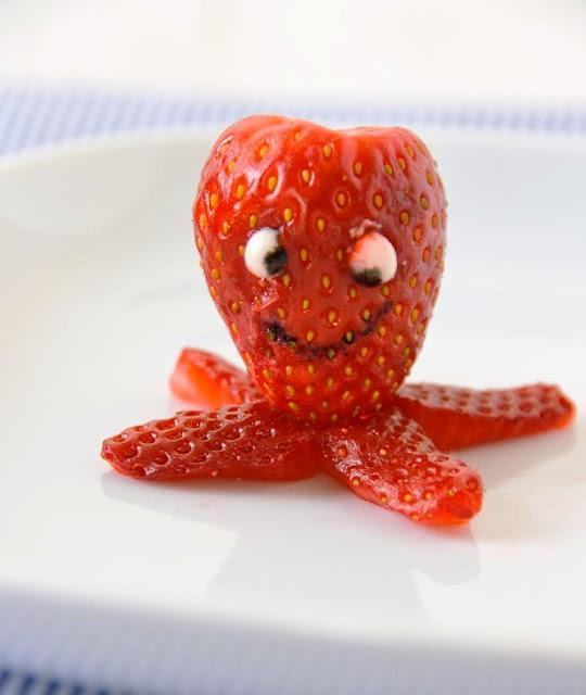 animal figure made out of  strawberry