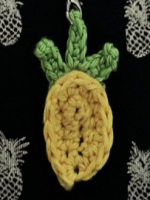 http://www.crochetfox.com/wp-content/uploads/Pineappe-Keychain.pdf