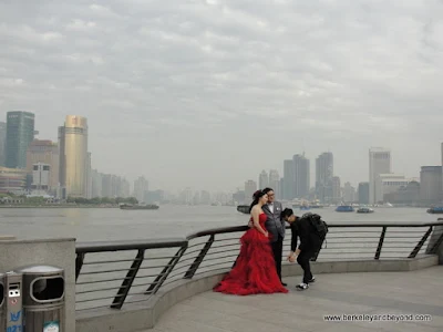 Chinese wedding couple on Bund in Shanghai, China