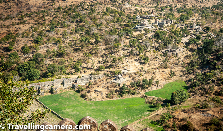 There is a huge cluster of Jain temples at a distance and a few others spread across the huge piece of land inside the fort. Not only temples, we also observed a dam kind of structure at a distance. After seeing all that from the top of Badal Palace inside the fort, I felt like walking down to those hills and have a closer look at these old structures. I am sure Travellingcamera will also love to click photographs of these temples/structures which are not so common on internet. Let's see if I do that in future, but wanted to share this with viewers of our blog. I know many of you are hard-core travellers who are always keen on finding opportunities to explore things beyond touristy places and Kumbalgarh Fort offers that.