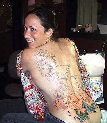 back tattoos for girls. Flower Tattoo Behind The Back