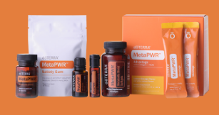 Image showcasing the doTERRA MetaPWR Starter System, a comprehensive metabolic health kit. The system includes a range of products: an amber glass bottle of MetaPWR Metabolic Blend Essential Oil with a dropper, a white container of MetaPWR Advantage collagen and NMN complex, a white bottle of MetaPWR Metabolic Assist with natural extracts and minerals, and a package of MetaPWR Assist dietary fiber. Each product is prominently displayed with the doTERRA logo and product names, arranged against a clean, health-themed backdrop, emphasizing a holistic approach to metabolic wellness.