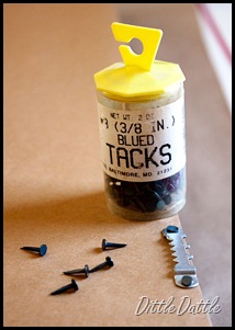 Upholstery-Tacks-to-hang-picture-hanger