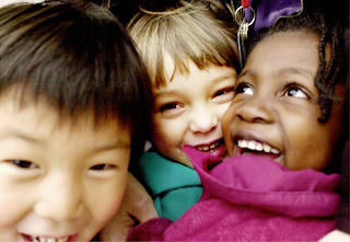 image: kids laughing together