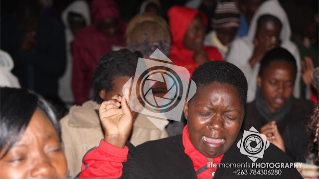 Woman In Deep Worship During The Service