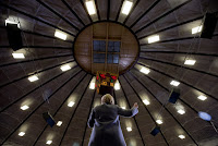 Are those high-efficiency lights? Clinton's new plan would seek to lower building energy use. (Credit: AP Photo/Andrew Harnik) Click to Enlarge.