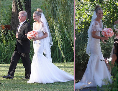  gown is beautiful with an illusion neckline and flutter cap sleeves