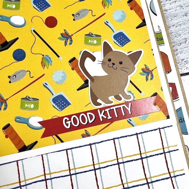 Cat Scrapbook Album page filled with kitten toys