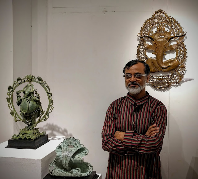 Somnath Chakraborty with his bronze sculptures of Ganesha for the show at Indiaart Gallery, Pune (www.indiaart.com)