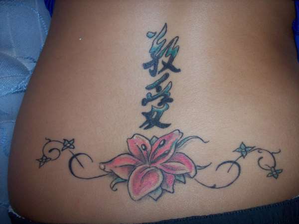 flower back tattoos. lower ack Flower Art Tattoo