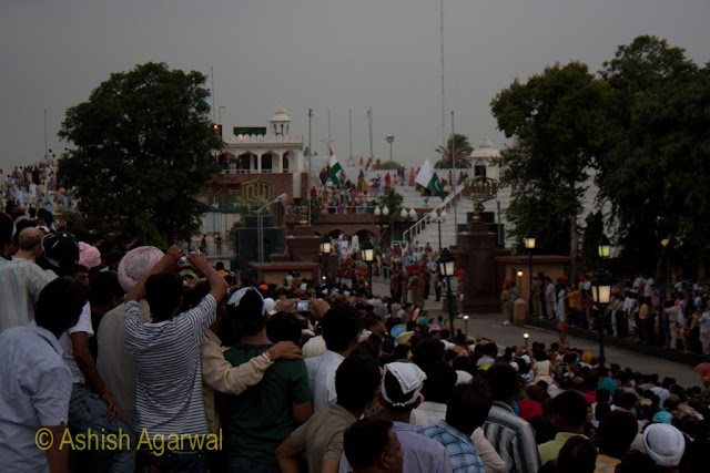 Flags halfway down the flagstaff at the Beating the Retreat ceremony at Wagah Border near Amritsar