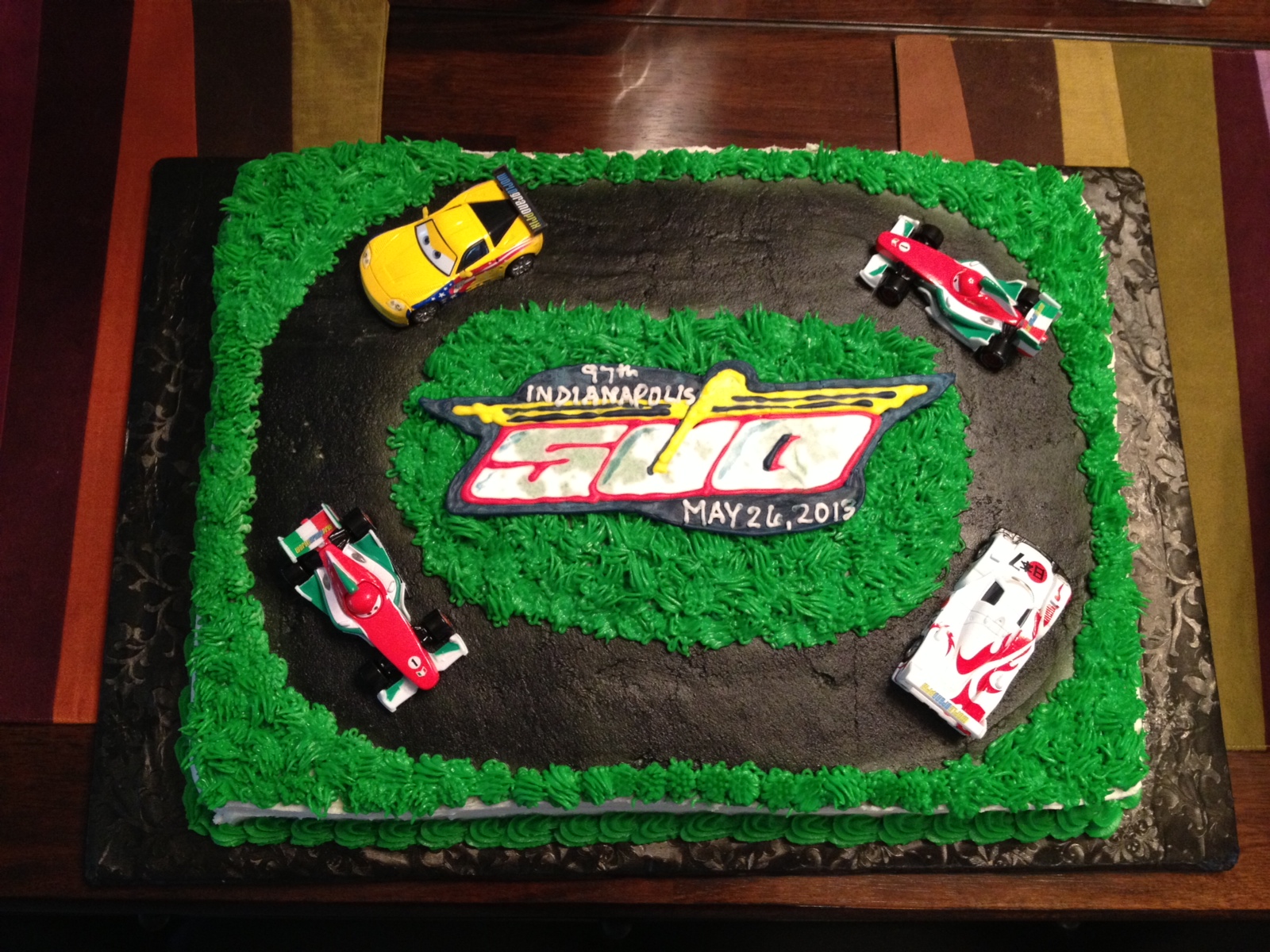 White cake with buttercream frosting. The Indy 500 logo is a colorflow ...