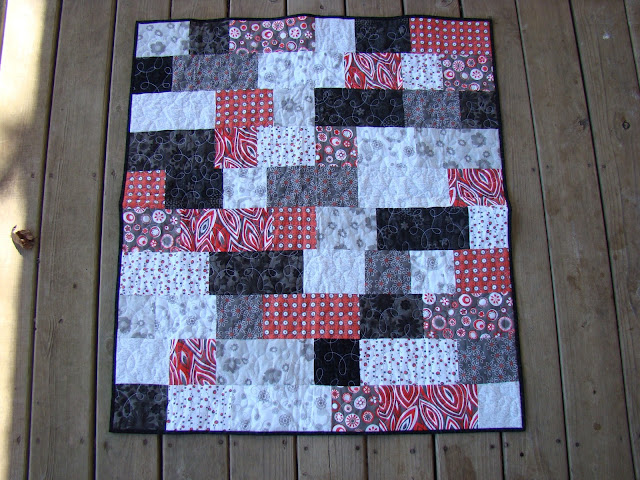 red and black bricks baby quilt