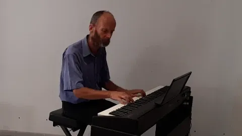 Meenhard on the piano