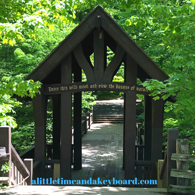 A covered bridge greets at the entrance of Seven Bridges Trail in Grant Park, South Milwaukee, Wisconsin.