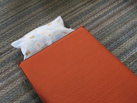 sleeping mat with attached pillow