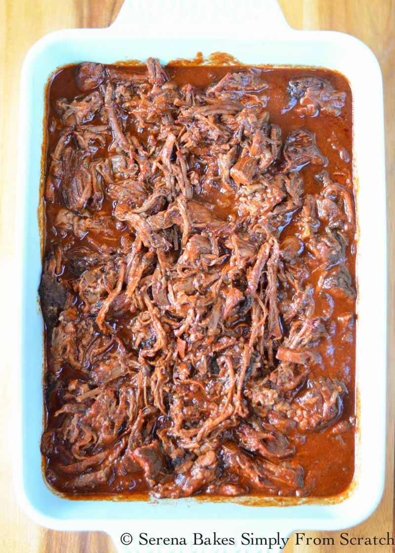 Smoked Pulled Beef Chuck Roast in Red Sauce.
