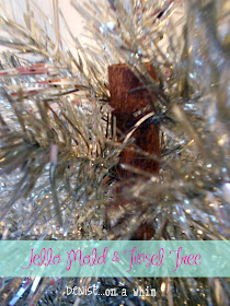 An old chair dowel becomes a Christmas tree via http://deniseoanwhim.blogspot.com