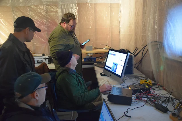 Dave K2JLV learning about PSK31 from Bob KD2QAK. Looking onward was Winn KD2HAF and Bob, a curious drone enthusiast who came with Winn and Ted K2MKD to his first Winter Field Day experience