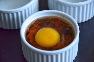 MEXICAN BAKED EGGS WITH BLACK BEANS, TOMATOES, CHILLI AND CORIANDER