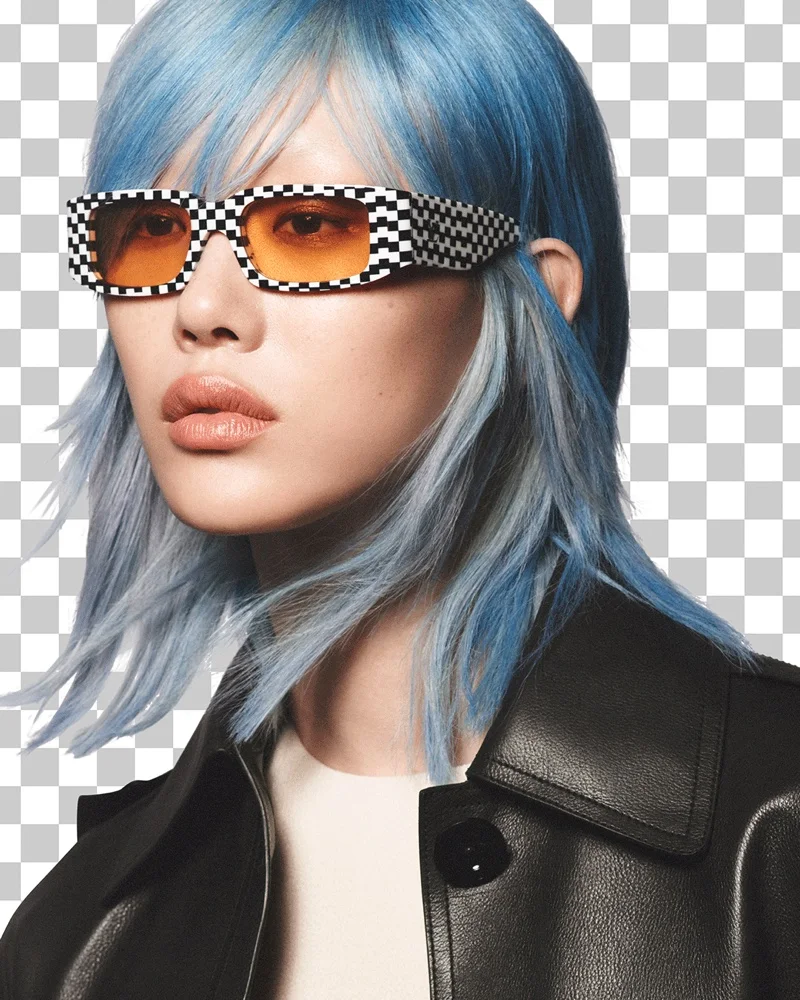 Sora Choi stuns with a blue hairstyle, rocking a leather jacket and statement sunglasses for Louis Vuitton pre-fall 2023