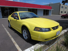 2003 Ford Mustang color change from yellow to black.