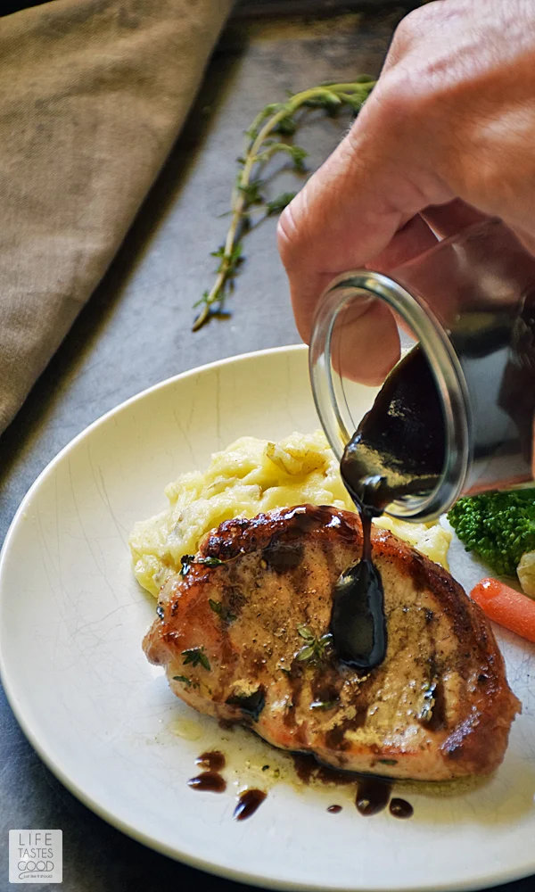 Pan Seared Boneless Pork Chops with a Tangy Raspberry Sauce | by Life Tastes Good is a quick and easy dinner ready in under 30 minutes, making it perfect any night of the week and good enough for company too! #LTGrecipes