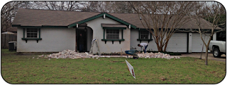 Blue Ridge house with demo debris in the front yard.