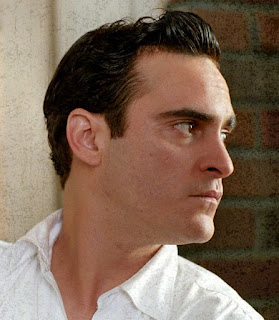 Joaquin Phoenix portraying Johnny Cash