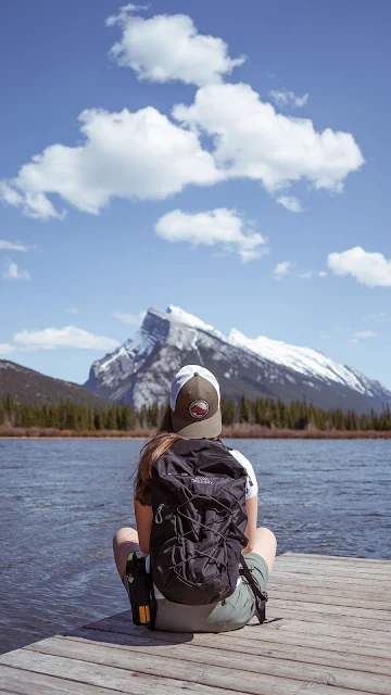 Alone Girl With Backpack Enjoying Mountains Landscape