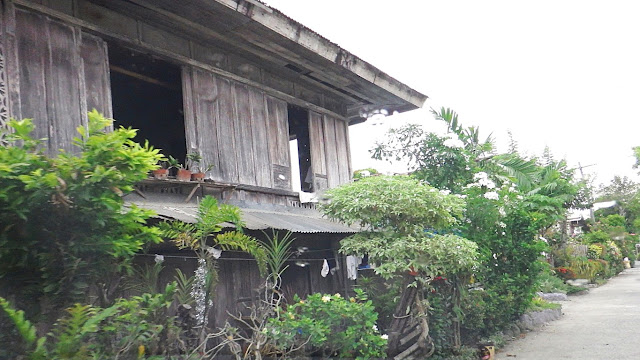 a dilapidating yet beautiful old wooden house in Malitbog Southern Leyte