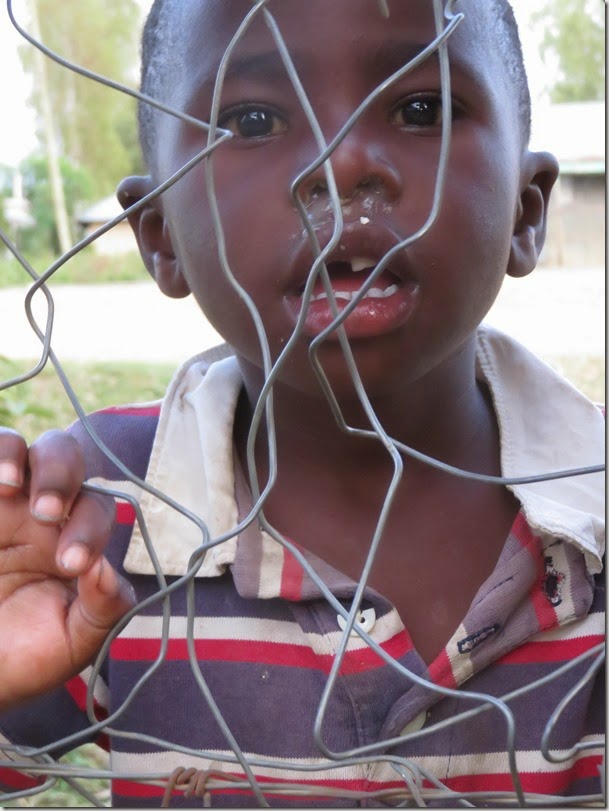 IMG_5739.BoyThruBarbedWire