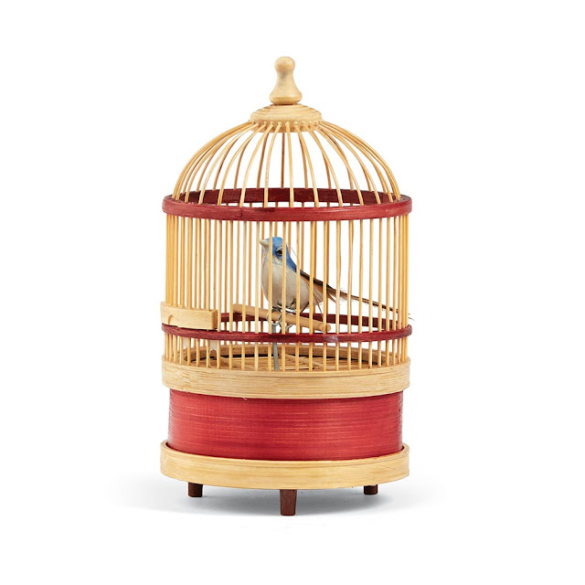 Mechanical Birds In Cage