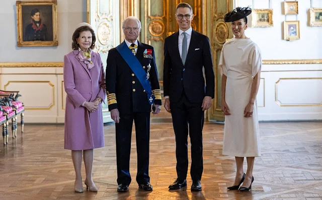 Princess Sofia wore a lemon Elinor dress by Andiata. Suzanne Innes-Stubb and Queen Silvia. Crown Princess Victoria