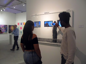 People taking selfies inside a Campello artwork 2017