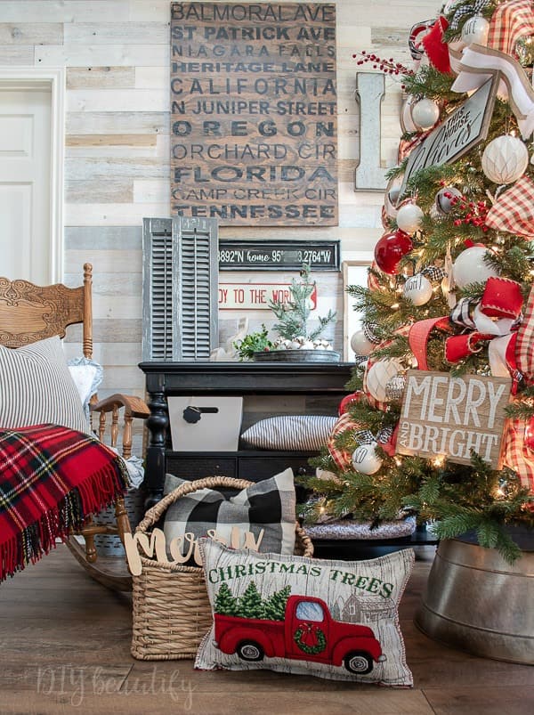 classic farmhouse Christmas tree, placemat pillow, tartan plaid throw, basket, wood wall