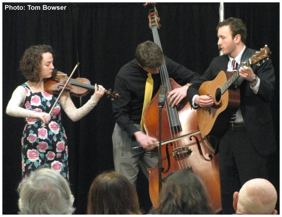 The band Ask Your Folks - Featuring: Owen Burton - Acoustic Guitar, Vocals, Libby Weitnauer - Violin, Vocals, Eli Broxham - Bass Fiddle | photograph by Tom Bowser