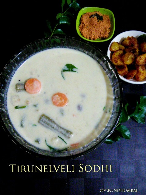 Sodhi is one of Tirunelveli's traditional and popular kuzhambu.This kuzhambu is a special menu on the next day of marriage. A Tirunelveli wedding meal would not be complete without this Sodhi, potato poriyal and ginger chutney.  It is prepared with coconut milk, moong dal, drumsticks, carrots, potatoes and plenty of aromatics like ginger, garlic, green chillies, small onions and lemon juice. The freshly extracted coconut milk gives you the perfect taste for this kuzhambu. We prepare this kuzhambu often during weekends, family get togethers and special occasions. My Mom, Grandma and Athai are experts in preparing this Sodhi.