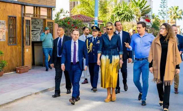 Queen Maxima wore a belted two-tone yellow and navy blue denim shirt dress by Zara, Mango, Massimo Dutti. Rabat and Casablanca